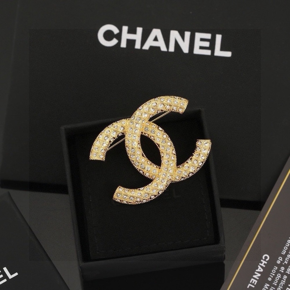 CHANEL Gold Crystal Logo Brooch